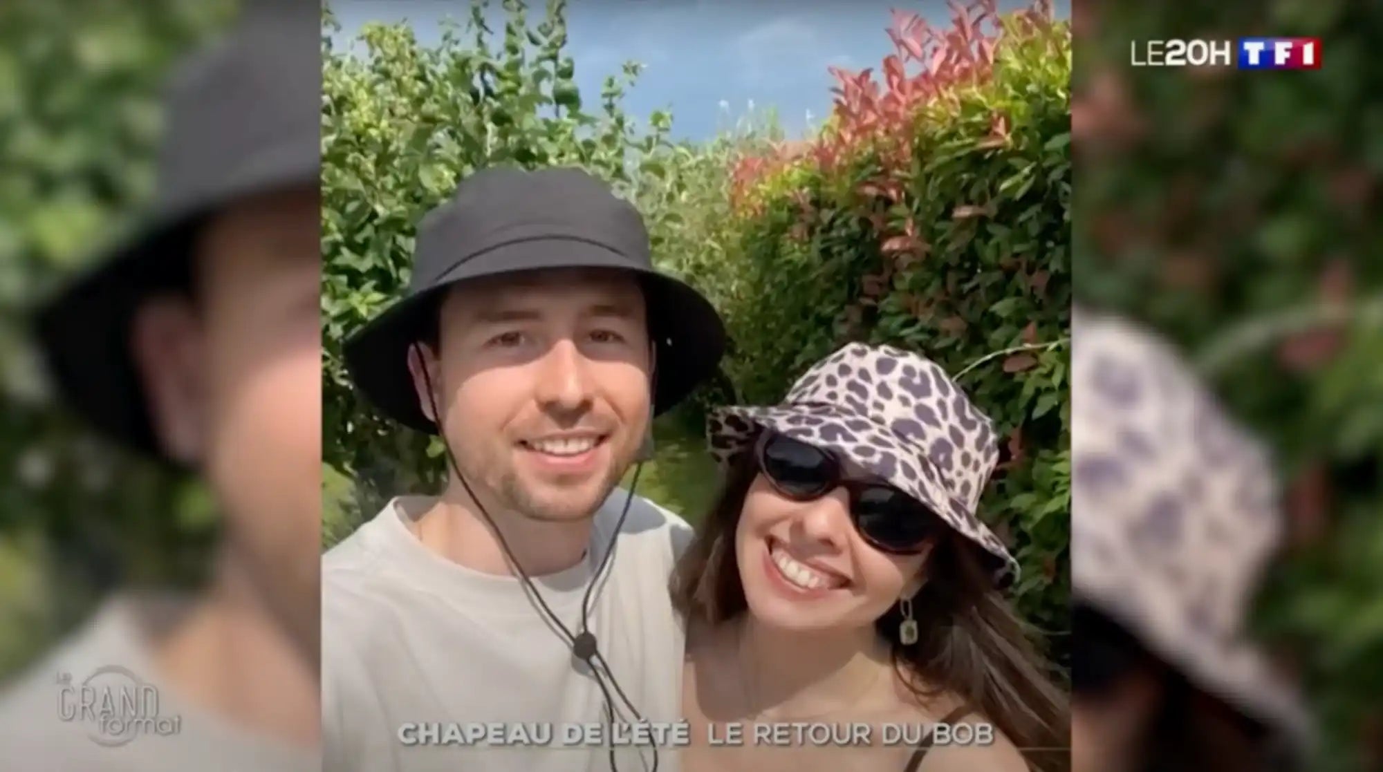 Couple souriant portant des chapeaux de seau.