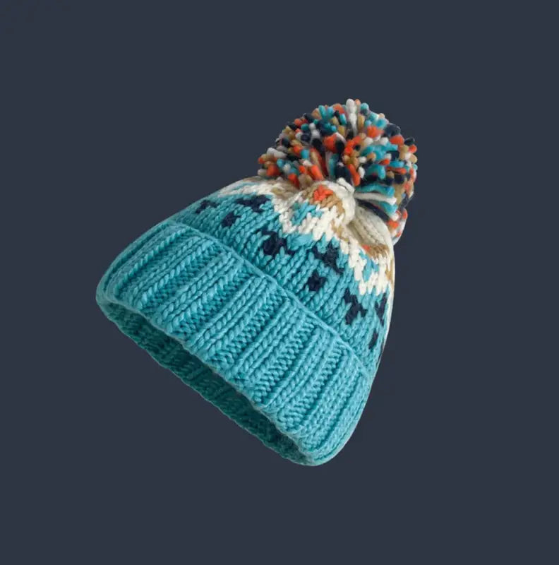 Bonnet à pompon bleu