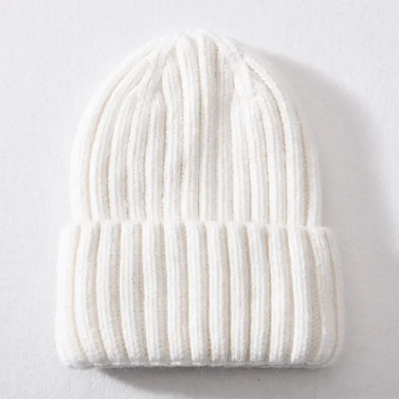 Bonnet en cachemire et intérieur satin blanc