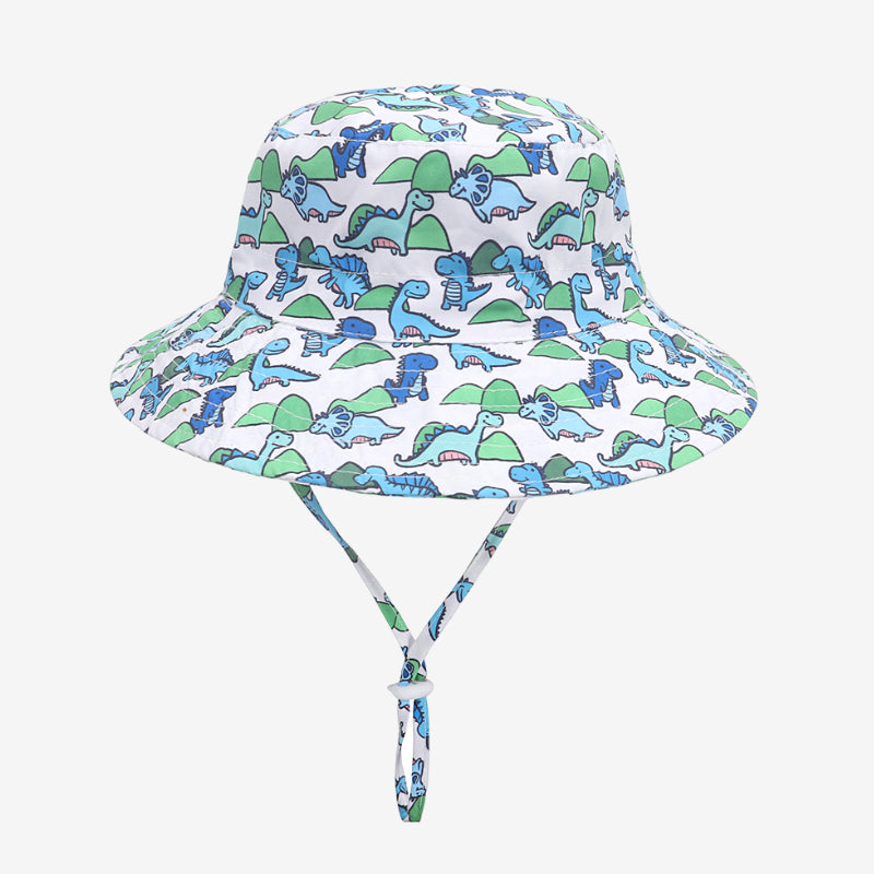 bob enfant avec des motifs de dinosaures bleus et verts