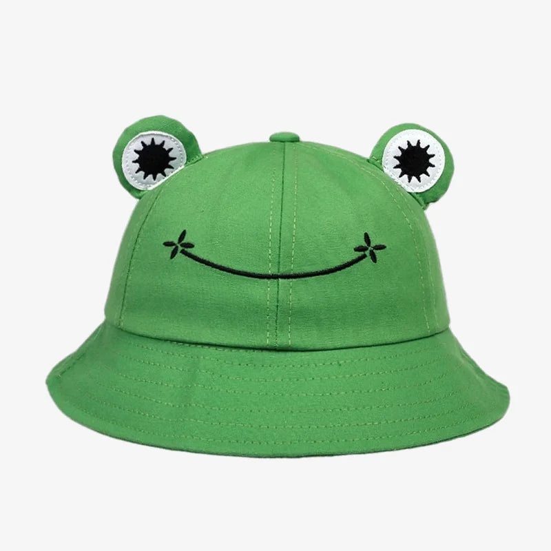 chapeau bob adulte en forme de grenouille qui sourit de couleur verte avec les yeux au dessus du bob